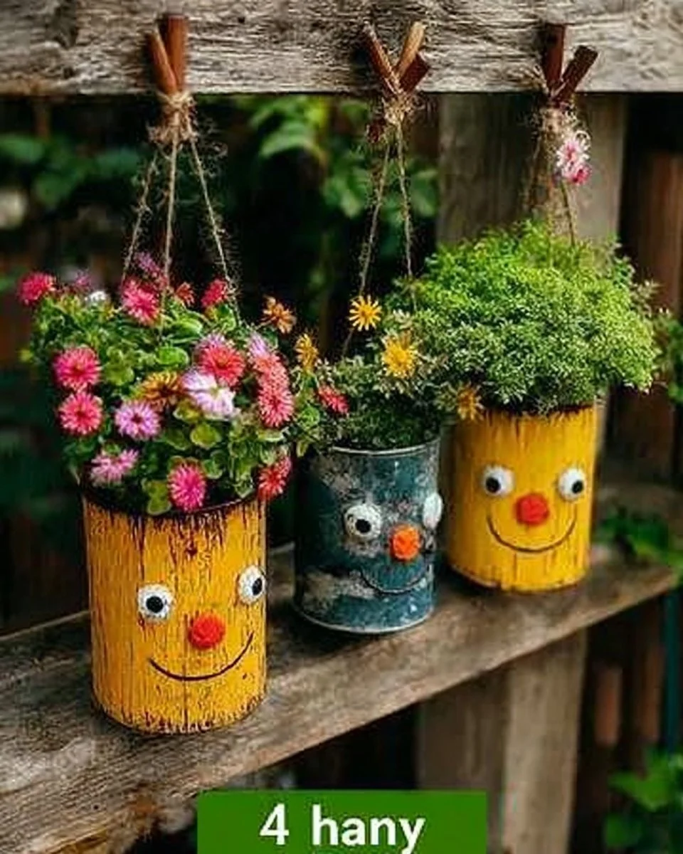 DIY tin can hanging planters filled with vibrant flowers, showcasing a creative craft project.